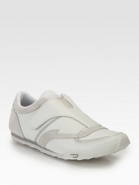 A flawless design, this casual slip-on sneaker constructed from a sublime blend of leather and suede exudes city cool, without sacrificing the comfort and ease you would except from a padded insole and a durable rubber sole .Leather/suede upperPadded insoleRubber soleImported A flawless design, this casual slip-on sneaker constructed from a sublime blend of leather and suede exudes city cool, without sacrificing the comfort and ease you would except from a padded insole and a durable rubber sole .Leather/suede upperPadded insoleRubber soleImported