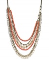 The colors of summer. INC International Concepts' warm-weather style features plastic beads and glass rondelles in vibrant coral hues. Set in mixed metal. Approximate length: 33 inches. Approximate drop: 6 inches.