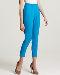 An laid-back silhouette in luxurious silk, these cropped Theory pants make a bright statement in neon blue, lighting up your collection with the playful spring trend. An laid-back silhouette in luxurious silk, these cropped Theory pants make a bright statement in neon blue, lighting up your collection with the playful spring trend.