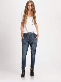 Lightly distressed jeans take on a modern form with an asymmetrical overlap panel and a harem-inspired fit. THE FITRise, about 8Inseam, about 29THE DETAILSAsymmetrical overlap panelZip flyFive-pocket style98% cotton/2% elastaneMachine washMade in Italy of imported fabricModel shown is 5'10 (177cm) wearing US size 4. Lightly distressed jeans take on a modern form with an asymmetrical overlap panel and a harem-inspired fit. THE FITRise, about 8Inseam, about 29THE DETAILSAsymmetrical overlap panelZip flyFive-pocket style98% cotton/2% elastaneMachine washMade in Italy of imported fabricModel shown is 5'10 (177cm) wearing US size 4.