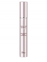 New Capture Totale Multi-Perfection Eye Treatment targets the skin's own youth preserving cells to intensely correct all signs of aging. The silky crème instantly smooths, firms and brightens the eye contour while visibly diminishing the appearance of fine lines, wrinkles and dark circles. 0.5 oz. New Capture Totale Multi-Perfection Eye Treatment targets the skin's own youth preserving cells to intensely correct all signs of aging. The silky crème instantly smooths, firms and brightens the eye contour while visibly diminishing the appearance of fine lines, wrinkles and dark circles. 0.5 oz.