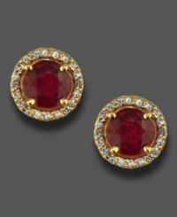 Add warm elegance to any look with these sparkling earrings featuring oval-cut rubies (2 ct. t.w.) surrounded by round-cut diamonds (1/5 ct. t.w.) in a 14k rose gold setting. Add warm elegance to any look with these sparkling earrings featuring oval-cut rubies (2 ct. t.w.) surrounded by round-cut diamonds (1/5 ct. t.w.) in a 14k rose gold setting.