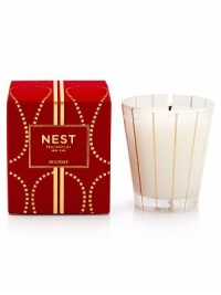 Captures the aroma of a sparkling holiday season. Classic single-wick candle fragrance with inviting notes of pomegranate, mandarin orange, pine, cloves and cinnamon. Housed in an elegant glass vessel and presented in a red velvet box. Created by Laura Slatkin. Approximately 50 hours of burn time. 7.8 oz. Captures the aroma of a sparkling holiday season. Classic single-wick candle fragrance with inviting notes of pomegranate, mandarin orange, pine, cloves and cinnamon. Housed in an elegant glass vessel and presented in a red velvet box. Created by Laura Slatkin. Approximately 50 hours of burn time. 7.8 oz.
