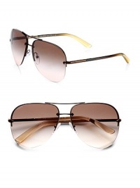 Double-bridge design and tubular stems with logo detail define this classic aviator style. Available in pale gold frames with brown gradient lenses.MetalLogo temple detail100% UV ProtectionMade in Italy Double-bridge design and tubular stems with logo detail define this classic aviator style. Available in pale gold frames with brown gradient lenses.MetalLogo temple detail100% UV ProtectionMade in Italy