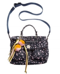 This playful design from Teen Vogue will have you seeing stars. An on-the-go messenger silhouette is covered with an all-over star pattern and fun bow and pom-pom charms at handle base. This playful design from Teen Vogue will have you seeing stars. An on-the-go messenger silhouette is covered with an all-over star pattern and fun bow and pom-pom charms at handle base.