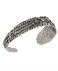 A fashion-forward feather motif defines Lucky Brand's cuff bracelet. Crafted from silver-tone mixed metal. Approximate diameter: 2-1/4 inches.