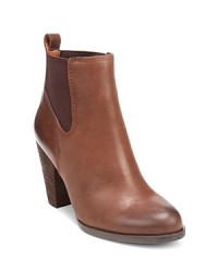 These Lucky Brand booties offer a whisper of Western flair with stacked heels, side goring and pull tab details. These Lucky Brand booties offer a whisper of Western flair with stacked heels, side goring and pull tab details.