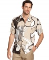 You'll be a work of art in this abstract-print shirt from Cubavera.