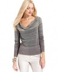 Snuggle into this easy sweater from DKNY Jeans, featuring allover metallic marled knit in comfy cotton. Snuggle into this easy sweater from DKNY Jeans, featuring allover metallic marled knit in comfy cotton.