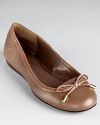 Lauren Ralph Lauren's classic Miram flats slip-on-and-go with the addition of elastic goring at the bow-wrapped toe.