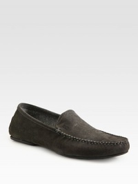 Sporty suede slip-on with stitch detail and an embossed logo.Suede upperRubber soleImported Sporty suede slip-on with stitch detail and an embossed logo.Suede upperRubber soleImported