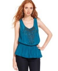 Inspired by a vintage camisole, this beaded DKNY Jeans tank top is an effortless piece for summer. Wear it into fall with black jeans and a fitted blazer.