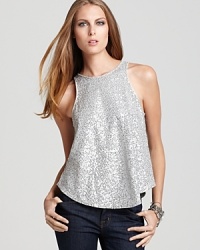 Dazzle them in this gleaming, sequin-lavished Dolce Vita top--it's the festive little top for jazzing up jeans or popping basic black. Dazzle them in this gleaming, sequin-lavished Dolce Vita top--it's the festive little top for jazzing up jeans or popping basic black.