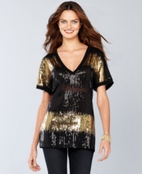 Contrasting sequins add a unique touch to INC's tunic. Another sexy surprise: the semi-sheer fabric shows just the right amount of skin! Contrasting sequins add a unique touch to INC's tunic. Another sexy surprise: the semi-sheer fabric shows just the right amount of skin!