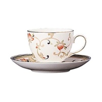 Oberon's delicate floral pattern recalls the first blossoms of spring, yet is understated enough to complement any table decor. Bone china.