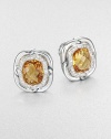 From the Labyrinth Collection. Beautiful, faceted citrine surrounded by dazzling diamonds and sleek sterling silver. CitrineDiamonds, .24 tcwSterling silverSize, about .39Omega post backImported 