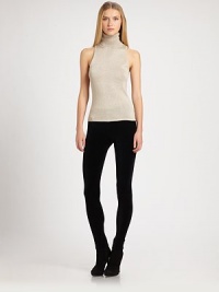 This sleeveless knit design is shot through with shimmering metallic threads.TurtleneckSleeveless71% silk/28% metallic thread/1% nylonDry cleanImported of Italian fabricModel shown is 5'11 (180cm) wearing US size Small. This sleeveless knit design is shot through with shimmering metallic threads.TurtleneckSleeveless71% silk/28% metallic thread/1% nylonDry cleanImported of Italian fabricModel shown is 5'11 (180cm) wearing US size Small.