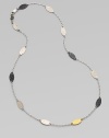 From the Willow Collection. This elegant chain stationed with leaves of hammered metal - white and blackened sterling silver and 24k yellow gold - is at once modern and earthy.Sterling silver 24k yellow gold Chain length, about 16 Pelican clasp Imported
