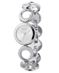 Simple geometry never looked so divine than in this elegant women's watch from DKNY. Featuring a silvertone stainless steel bracelet with snap-off adjustable links. Round stainless steel case. White round dial with logo. Quartz movement. Water resistant to 30 meters. Two-year limited warranty. Simple geometry never looked so divine than in this elegant women's watch from DKNY. Featuring a silvertone stainless steel bracelet with snap-off adjustable links. Round stainless steel case. White round dial with logo. Quartz movement. Water resistant to 30 meters. Two-year limited warranty.