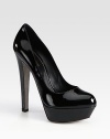 Low-cut patent leather style with a sky-high heel and a platform. Self-covered heel, 6 (150mm)Covered platform, 1 (25mm)Compares to 5 heel (125mm)Patent leather upperLeather lining and solePadded insoleMade in ItalyOUR FIT MODEL RECOMMENDS ordering one size up as this style runs small. 