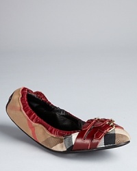Burberry packs major style into slight ballerina flats, with a triple buckle detail and rich claret leather accents on a signature plaid backdrop. Burberry packs major style into slight ballerina flats, with a triple buckle detail and rich claret leather accents on a signature plaid backdrop.