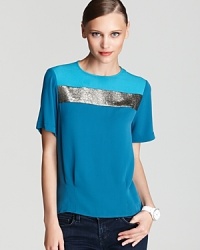 Light as air and rendered in pure silk, this breezy DIANE von FURSTENBERG top features a chic metallic stripe and refined waist-defining pleats. Light as air and rendered in pure silk, this breezy DIANE von FURSTENBERG top features a chic metallic stripe and refined waist-defining pleats.