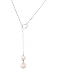 Simply elegant. This necklace from Majorica is crafted from sterling silver with organic man-made pearls (10/12 mm) adding a classic touch for the pendant. Approximate length: 20 inches. Approximate drop: 2-1/2 inches. Simply elegant. This necklace from Majorica is crafted from sterling silver with organic man-made pearls (10/12 mm) adding a classic touch for the pendant. Approximate length: 20 inches. Approximate drop: 2-1/2 inches.