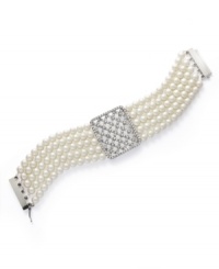 With a name like High Society, this bracelet was bound to exude elegance! Lauren by Ralph Lauren's luxurious five-row style combines shimmering glass pearls (6 mm) with a unique, glass-accented basket weave charm. Setting and slide closure crafted in silver tone mixed metal. Approximate length: 7-1/2 inches. With a name like High Society, this bracelet was bound to exude elegance! Lauren by Ralph Lauren's luxurious five-row style combines shimmering glass pearls (6 mm) with a unique, glass-accented basket weave charm. Setting and slide closure crafted in silver tone mixed metal. Approximate length: 7-1/2 inches.