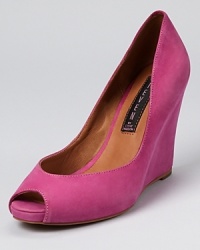 Impossibly soft, matte nubuck leather showcases classic style on a timeless wedge silhouette. From STEVEN BY STEVE MADDEN. Impossibly soft, matte nubuck leather showcases classic style on a timeless wedge silhouette. From STEVEN BY STEVE MADDEN.