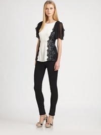 Light-as-air lace adorns the front of this stretch-silk top. It's complemented flawlessly by sheer, flutter sleeves.Round neckFlutter sleevesPull-on styleAbout 25 from shoulder to hem93% silk/7% elastaneDry cleanImported Model shown is 5'10½ (179cm) wearing US size Small. Light-as-air lace adorns the front of this stretch-silk top. It's complemented flawlessly by sheer, flutter sleeves.Round neckFlutter sleevesPull-on styleAbout 25 from shoulder to hem93% silk/7% elastaneDry cleanImported Model shown is 5'10½ (179cm) wearing US size Small.