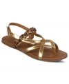 Complete your look with one final flourish. Carlos by Carlos Santana's Finesse flat sandals feature a braided leopard print strap that contrasts excellently with the other shiny metallic ones.