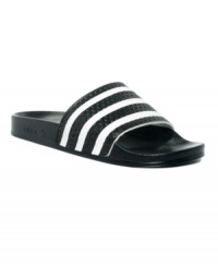 Post-gym or pre-pool, these staple slide men's sandals from adidas keep you comfortable and cool with every step. Post-gym or pre-pool, these staple slide men's sandals from adidas keep you comfortable and cool with every step.