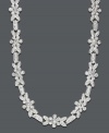 The perfect complement to your favorite evening gown. This sparkling Charter Club necklace features crystal flowers and links set in silver tone mixed metal. Approximate length: 16-1/2 inches.