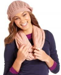 Top off your cold weather ensemble with this chic slouchy hat from American rag that features an elegant open knit design. Pairs perfectly with puffer jackets or long wool coats. Top off your cold weather ensemble with this chic slouchy hat from American rag that features an elegant open knit design. Pairs perfectly with puffer jackets or long wool coats.