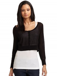 THE LOOKSemi-sheerWide scoopneckButton frontLong sleeves with banded cuffsTHE FITAbout 16 from shoulder to hemTHE MATERIAL57% rayon/43% cottonCARE & ORIGINDry cleanImportedModel shown is 5'10 (177cm) wearing US size Small. THE LOOKSemi-sheerWide scoopneckButton frontLong sleeves with banded cuffsTHE FITAbout 16 from shoulder to hemTHE MATERIAL57% rayon/43% cottonCARE & ORIGINDry cleanImportedModel shown is 5'10 (177cm) wearing US size Small.