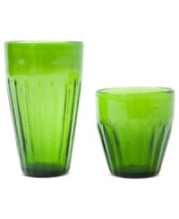 A fluted base, saturated color and bubbles suspended in the glass add a charming ease to Marcela's Rustic green highball and double old-fashioned glasses for Prima Design. A fluted base, saturated color and bubbles suspended in the glass add a charming ease to Marcela's Rustic green highball and double old-fashioned glasses for Prima Design.