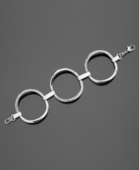 Your everyday wardrobe gets a sophisticated finish with this link bracelet from GUESS. Featuring crystal accents set in silvertone mixed metal. Approximate length: 7-1/2 inches. Your everyday wardrobe gets a sophisticated finish with this link bracelet from GUESS. Featuring crystal accents set in silvertone mixed metal. Approximate length: 7-1/2 inches.