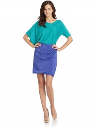 THE LOOKAsymmetrical necklineOne short sleeve; one dolman sleeveAsymmetrical piped seamWide, asymmetrical banded hemTHE FITAbout 26 from shoulder to hemTHE MATERIAL55% silk/45% cashmereCARE & ORIGINDry cleanImportedModel shown is 5'9½ (176cm) wearing US size Small. THE LOOKAsymmetrical necklineOne short sleeve; one dolman sleeveAsymmetrical piped seamWide, asymmetrical banded hemTHE FITAbout 26 from shoulder to hemTHE MATERIAL55% silk/45% cashmereCARE & ORIGINDry cleanImportedModel shown is 5'9½ (176cm) wearing US size Small.