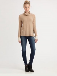 Luxe knit cashmere in a lightweight pullover styled with a soft, shapely cowlneck.CowlneckRaglan sleevesPullover styleRibbed trimCashmereHand washImportedModel shown is 5'10 (177cm) wearing US size Small. Luxe knit cashmere in a lightweight pullover styled with a soft, shapely cowlneck.CowlneckRaglan sleevesPullover styleRibbed trimCashmereHand washImportedModel shown is 5'10 (177cm) wearing US size Small.