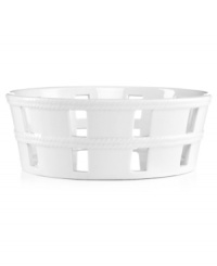 A bread basket woven of crisp white ceramic with embossed detail lends easy elegance to casual meals. From Martha Stewart Collection. A bread basket woven of crisp white ceramic with embossed detail lends easy elegance to casual meals. From Martha Stewart Collection.