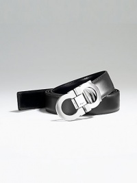 Smooth Italian calfskin reverses from black to brown. Nickel gancini buckle 1 wide Made in Italy