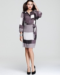 A geometric print in muted hues lends understated chic to Max & Cleo's versatile, printed dress. A geometric print in muted hues lends understated chic to Max & Cleo's versatile, printed dress.