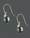 Diamonds accent faceted green amethyst, set in 14K yellow gold.