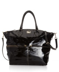 Take a shine to everyday accessorizing with this glossy patent leather satchel from Dooney & Bourke. Clean lines, discrete pockets and signature detailing lend an elegant look that works from desk-to-dinner. Take a shine to everyday accessorizing with this glossy patent leather satchel from Dooney & Bourke. Clean lines, discrete pockets and signature detailing lend an elegant look that works from desk-to-dinner.