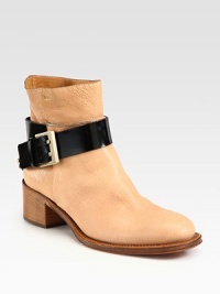 Timeless favorite of ultra-soft pebbled leather with a contrasting adjustable patent leather buckle strap. Stacked heel, 1½ (40mm)Leather upperPatent leather adjustable buckle strapLeather lining and solePadded insoleMade in Italy Timeless favorite of ultra-soft pebbled leather with a contrasting adjustable patent leather buckle strap. Stacked heel, 1½ (40mm)Leather upperPatent leather adjustable buckle strapLeather lining and solePadded insoleMade in Italy
