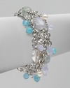 From the Bijoux Collection. A tangle of textural sterling silver chains are richly punctuated by blue and aqua chalcedony and pearl.Blue and aqua chalcedony and pearl Sterling silver Length, about 7 Toggle closure Imported