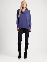 Luxe merino wool gives this simply sophisticated knit must-have appeal. Funnel neckRaglan sleevesCurved hi-lo hemRibbed trimPull-on styleAbout 32 from shoulder to hemMerino woolDry cleanImported of Italian fabric Model shown is 5'10 (177cm) wearing US size Small. Luxe merino wool gives this simply sophisticated knit must-have appeal. Funnel neckRaglan sleevesCurved hi-lo hemRibbed trimPull-on styleAbout 32 from shoulder to hemMerino woolDry cleanImported of Italian fabric Model shown is 5'10 (177cm) wearing US size Small.