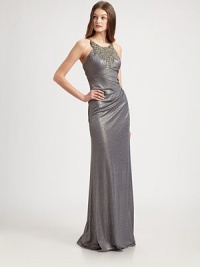 Shimmering and sleek, this festive, floor-length style is dressed up with an intricately beaded bodice.Beaded necklineSleevelessEmpire seamFully linedConcealed back zipAbout 51 from natural waist93% polyester/7% spandexDry cleanMade in USA of imported fabricModel shown is 5'10 (177cm) wearing US size 4. Shimmering and sleek, this festive, floor-length style is dressed up with an intricately beaded bodice.Beaded necklineSleevelessEmpire seamFully linedConcealed back zipAbout 51 from natural waist93% polyester/7% spandexDry cleanMade in USA of imported fabricModel shown is 5'10 (177cm) wearing US size 4.