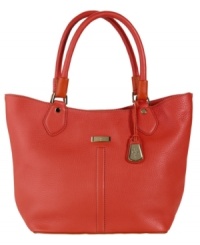 Perfect posture. The Village small triangle tote has all the makings of superior craftsmanship, complete with Cole Haan's signature soft pebble grain leather, custom hardware and an ideal, streamlined silhouette.