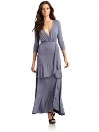 THE LOOKDeep v-neckThree-quarter length sleevesEmpire waistTiered asymmetric ruffles on the frontTHE FITAbout 59 from shoulder to hemTHE MATERIALModal/spandexCARE & ORIGINDry cleanMade in USAModel shown is 5'9½ (176cm) wearing US size Small. THE LOOKDeep v-neckThree-quarter length sleevesEmpire waistTiered asymmetric ruffles on the frontTHE FITAbout 59 from shoulder to hemTHE MATERIALModal/spandexCARE & ORIGINDry cleanMade in USAModel shown is 5'9½ (176cm) wearing US size Small.